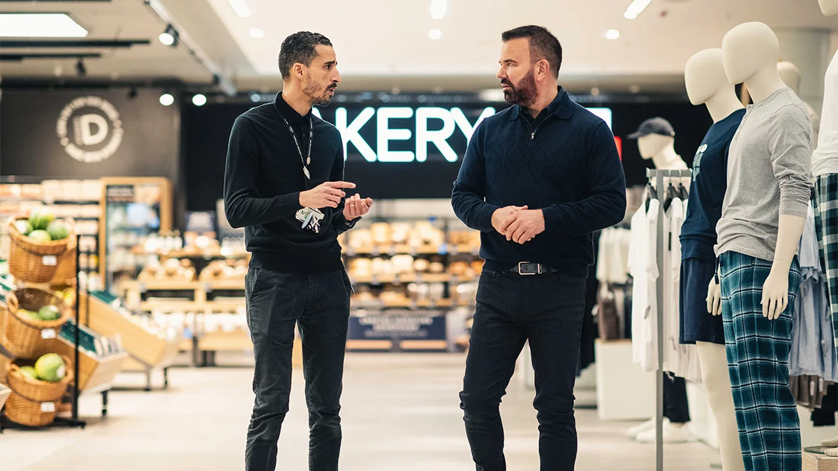 Stuart Machin talking to store manager